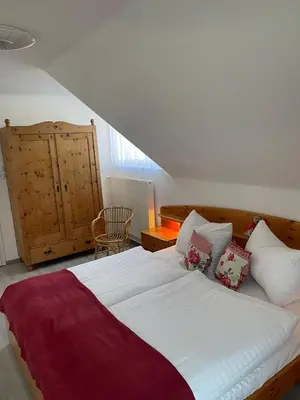 Ein Bett oder Betten in einem Zimmer der Unterkunft Haus Burda