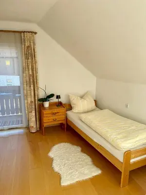 Ein Bett oder Betten in einem Zimmer der Unterkunft Haus Burda