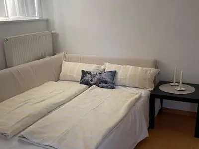 Ein Bett oder Betten in einem Zimmer der Unterkunft Haus Burda