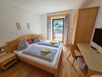 Ein Bett oder Betten in einem Zimmer der Unterkunft Ferienhaus Almfrieden