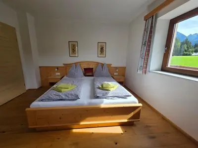 Ein Bett oder Betten in einem Zimmer der Unterkunft Ferienhaus Almfrieden