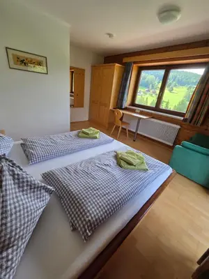Ein Bett oder Betten in einem Zimmer der Unterkunft Ferienhaus Almfrieden