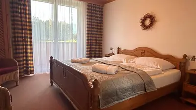 Ein Bett oder Betten in einem Zimmer der Unterkunft Pension Edelweiß Mitterberg