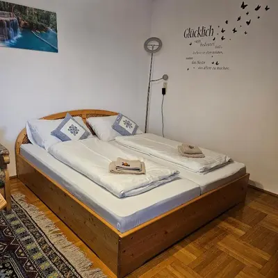 Ein Bett oder Betten in einem Zimmer der Unterkunft Ferienwohnung Brzyski