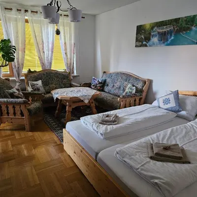 Ein Bett oder Betten in einem Zimmer der Unterkunft Ferienwohnung Brzyski
