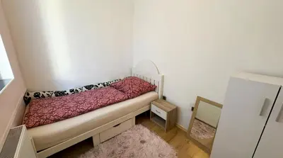 Ein Bett oder Betten in einem Zimmer der Unterkunft Ferienwohnung mit viel Platz