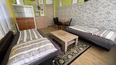 Ein Bett oder Betten in einem Zimmer der Unterkunft Ferienwohnung mit viel Platz