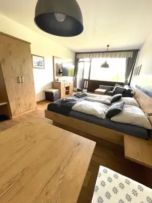 Ein Bett oder Betten in einem Zimmer der Unterkunft Apartment Alpenblick Bad Goisern