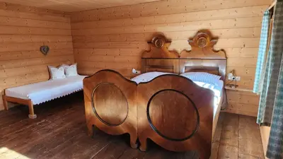 Ein Bett oder Betten in einem Zimmer der Unterkunft Ferienhaus Eckstoa