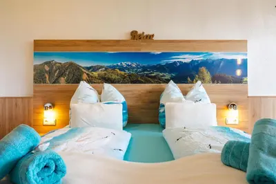 Ein Bett oder Betten in einem Zimmer der Unterkunft Ferienwohnung Glücksmomente