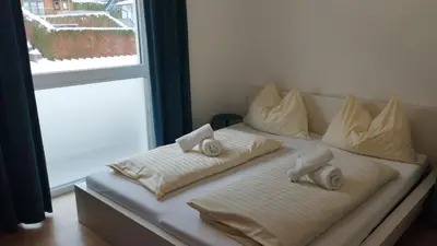 Ein Bett oder Betten in einem Zimmer der Unterkunft Apartment Bergblick by Alpenidyll Apartments