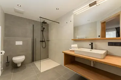 Ein Badezimmer in der Unterkunft Das Ennshaus by Schladming-Appartements