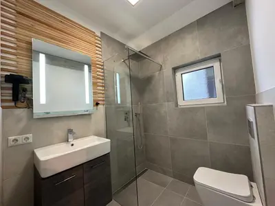 Ein Badezimmer in der Unterkunft AlpLoft Apartment Top1