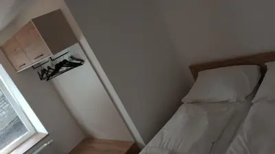 Ein Bett oder Betten in einem Zimmer der Unterkunft NRV twee-persoonskamer met gemeenschappelijke keuken