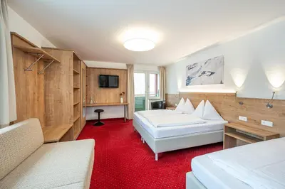 Ein Bett oder Betten in einem Zimmer der Unterkunft Hotel Appartement Winter