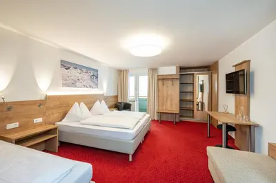 Ein Bett oder Betten in einem Zimmer der Unterkunft Hotel Appartement Winter