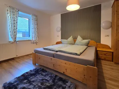 Ein Bett oder Betten in einem Zimmer der Unterkunft Botenwirt - Self Check in