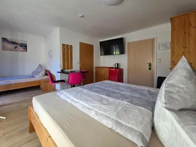 Ein Bett oder Betten in einem Zimmer der Unterkunft Botenwirt - Self Check in