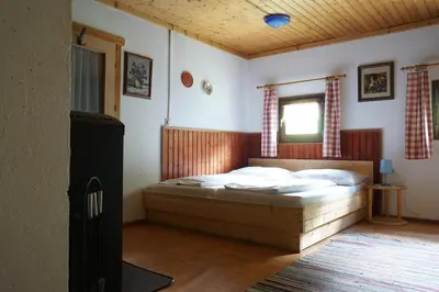Ein Bett oder Betten in einem Zimmer der Unterkunft Wurzeggeralm