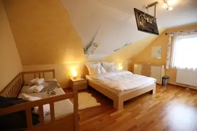 Ein Bett oder Betten in einem Zimmer der Unterkunft Ferienhaus Aich by Alpenidyll Apartments