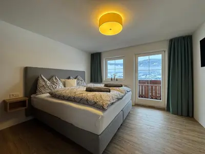 Ein Bett oder Betten in einem Zimmer der Unterkunft Appartement Radstadtblick