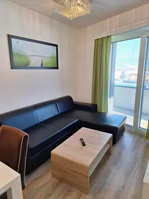 Ein Sitzbereich in der Unterkunft Ferienwohnung Mentenwirt Alp Lungau