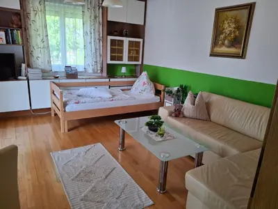 Ein Bett oder Betten in einem Zimmer der Unterkunft Maria's Ferienwohnung