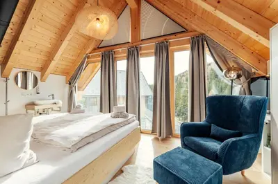 Ein Bett oder Betten in einem Zimmer der Unterkunft Rehfugium Lachtal by ALPS RESORTS