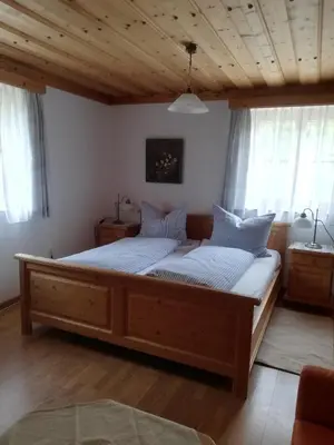 Ein Bett oder Betten in einem Zimmer der Unterkunft Ferienwohnung Gaiswinkler