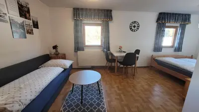Ein Bett oder Betten in einem Zimmer der Unterkunft Ferienwohnung Mitterdiel