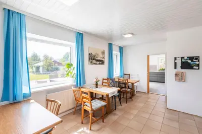 Ein Sitzbereich in der Unterkunft Gästehaus Drachennest