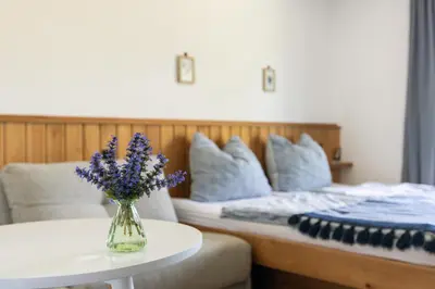 Ein Bett oder Betten in einem Zimmer der Unterkunft Gästehaus Drachennest
