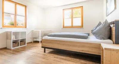 Ein Bett oder Betten in einem Zimmer der Unterkunft Maierlehen