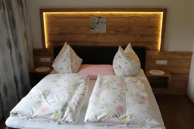 Ein Bett oder Betten in einem Zimmer der Unterkunft Haus Sonnwinkl