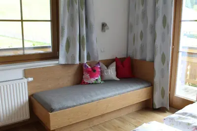 Ein Bett oder Betten in einem Zimmer der Unterkunft Haus Sonnwinkl