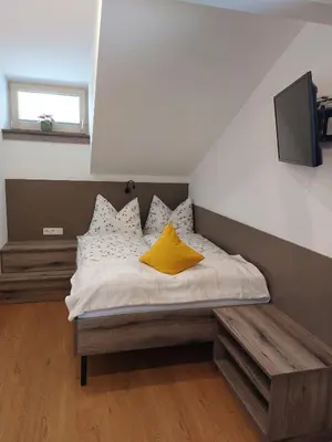 Ein Bett oder Betten in einem Zimmer der Unterkunft Apartments-Salzkammergut Hallstättersee