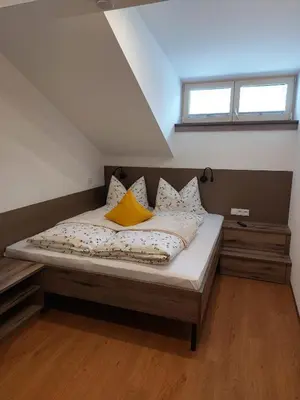 Ein Bett oder Betten in einem Zimmer der Unterkunft Apartments-Salzkammergut Hallstättersee