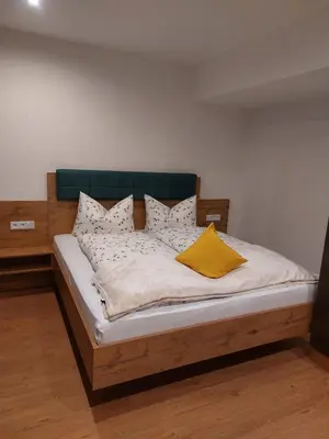 Ein Bett oder Betten in einem Zimmer der Unterkunft Apartments-Salzkammergut Gosausee