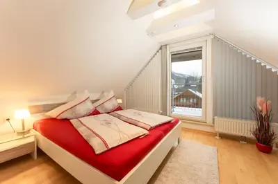 Ein Bett oder Betten in einem Zimmer der Unterkunft Appartements Knappenhaus by Schladming-Appartements