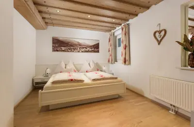 Ein Bett oder Betten in einem Zimmer der Unterkunft Appartements Knappenhaus by Schladming-Appartements