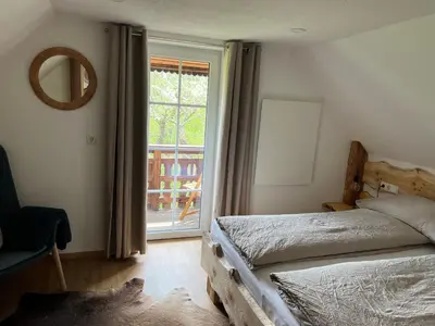 Ein Bett oder Betten in einem Zimmer der Unterkunft Ferienhaus energieautark in Mariahof