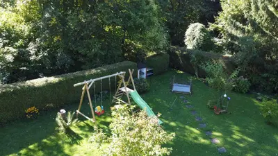 Ein Garten an der Unterkunft Ferienwohnung zum IRRSEE 79 Mondseeland
