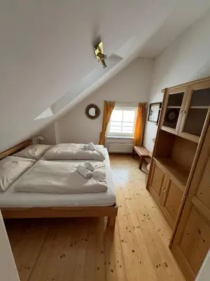 Ein Bett oder Betten in einem Zimmer der Unterkunft Fewo-Obertauern Maisonette
