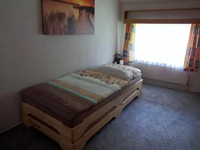 Ein Bett oder Betten in einem Zimmer der Unterkunft Ferienwohnung Piontek