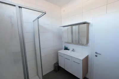 Ein Badezimmer in der Unterkunft Alpenherz Appartment