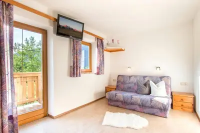 Ein Sitzbereich in der Unterkunft Ferienwohnung Haus Waldheim
