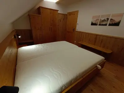 Ein Bett oder Betten in einem Zimmer der Unterkunft Brandnerhütte Tauplitzalm
