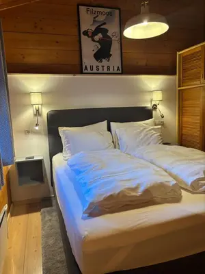 Ein Bett oder Betten in einem Zimmer der Unterkunft Luxury Filzmoos Chalet
