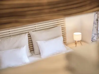Ein Bett oder Betten in einem Zimmer der Unterkunft Getaway Appartement 8 Hauser Kaibling by AA Holiday Homes