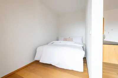 Ein Bett oder Betten in einem Zimmer der Unterkunft Alpenloft 204, NEU ab 2025